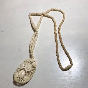 Long fake ivory floral beaded necklace